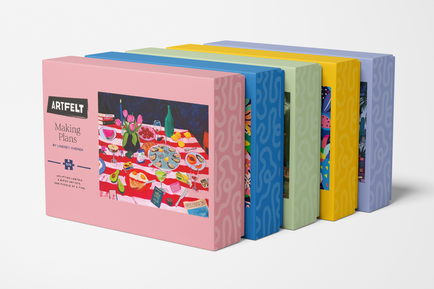 Set of colorful puzzle boxes with 'Artfelt' branding on a white background
