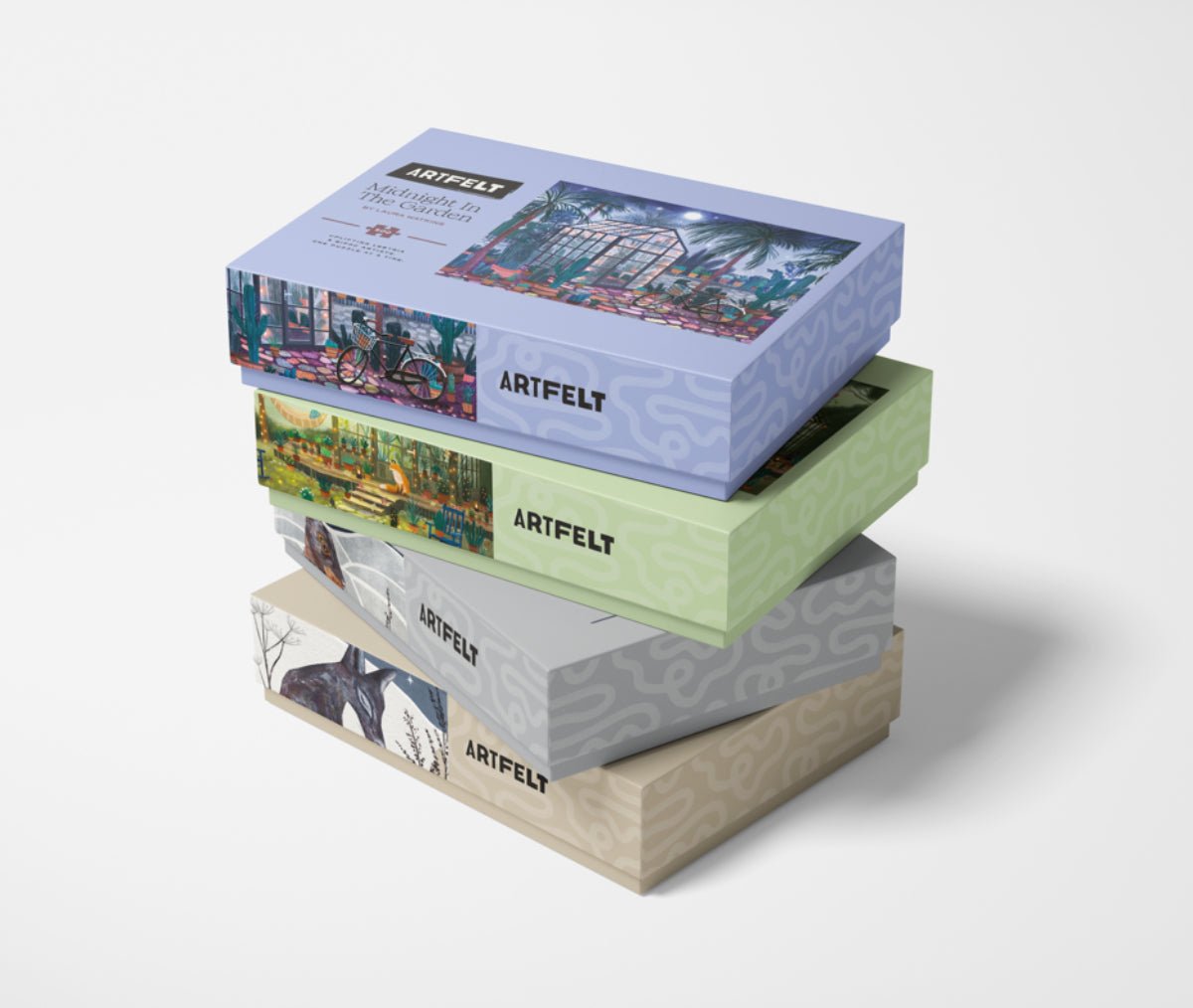 Midnight in the Garden Jigsaw Puzzle stacked with other Artfelt puzzle boxes