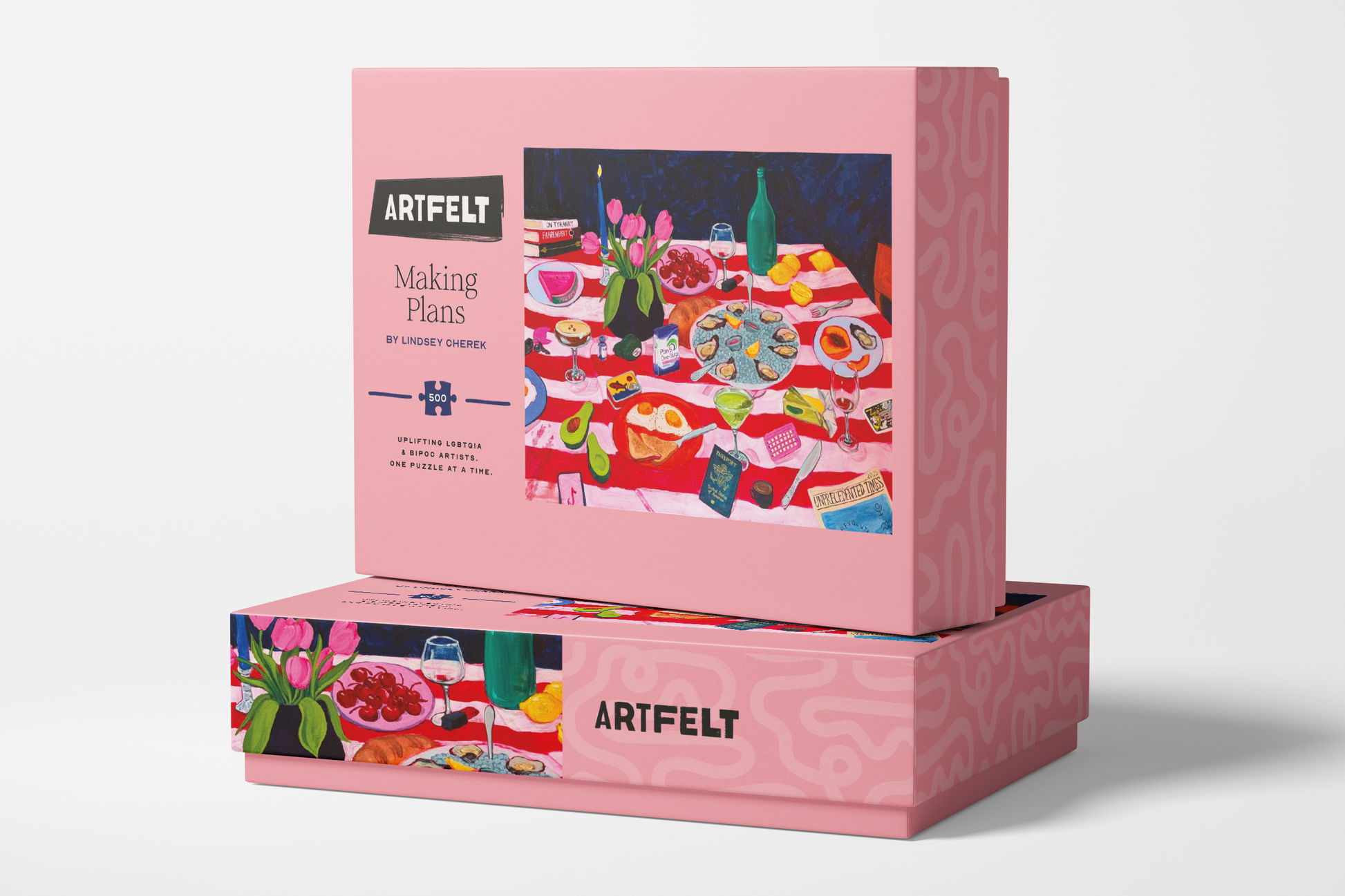 Making Plans jigsaw puzzle packaging box with a colorful illustration of a picnic scene and 'Artfelt' branding.